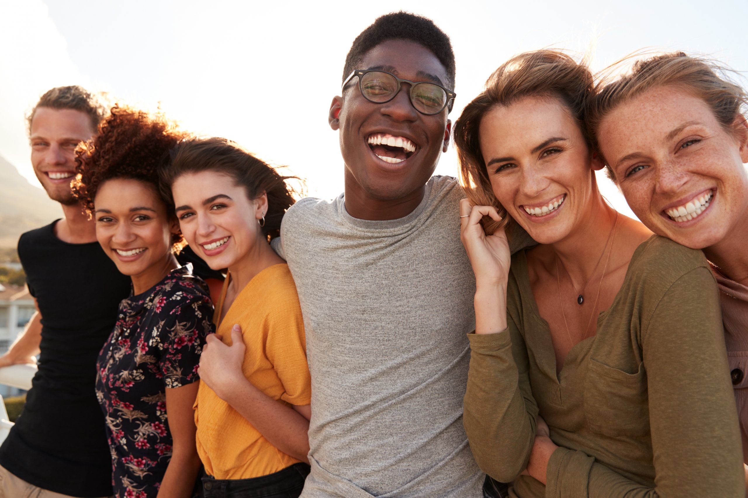 a candid photo of a group of smiling friends