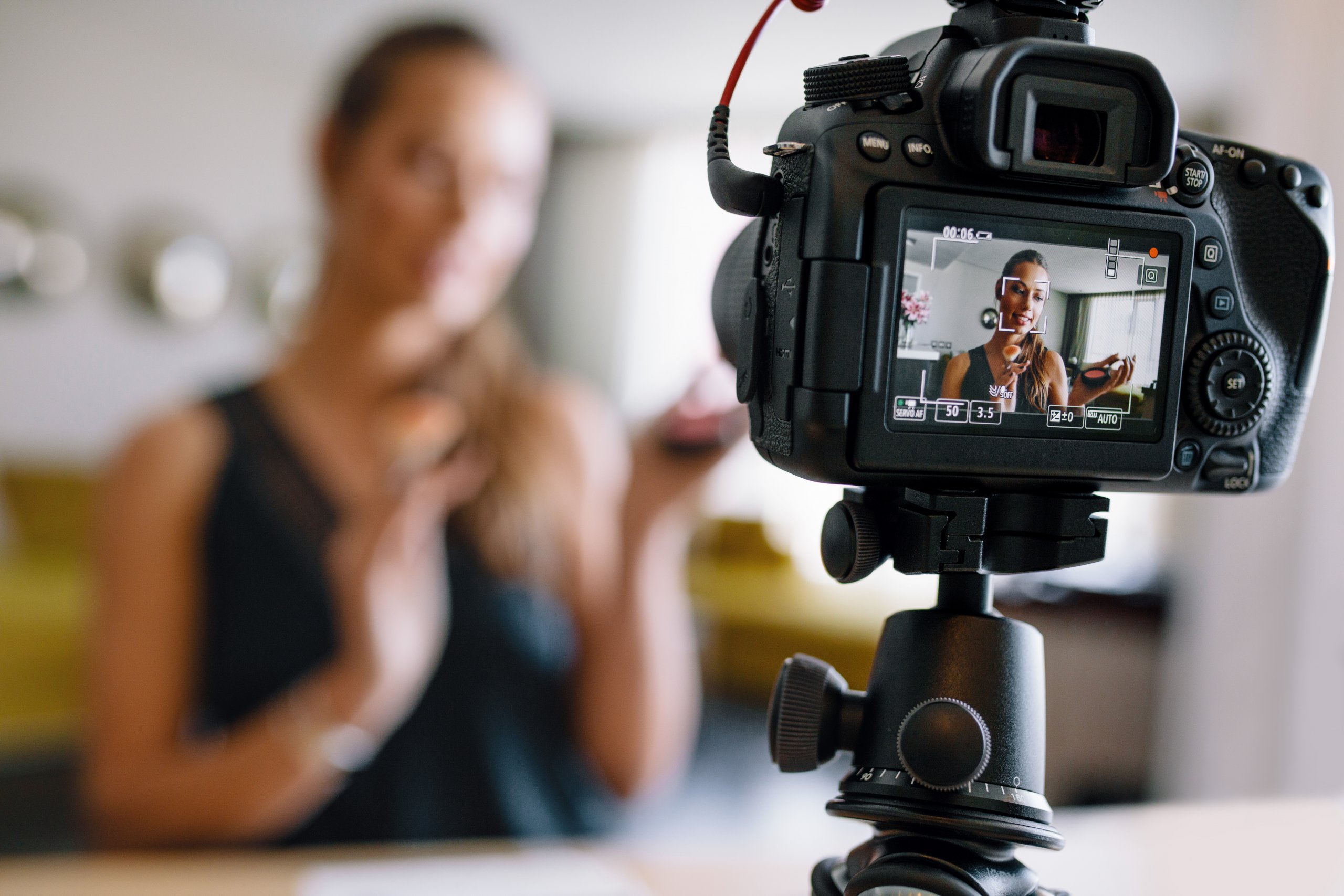 A community leader filming a video of her self for her Church Fundraising Community