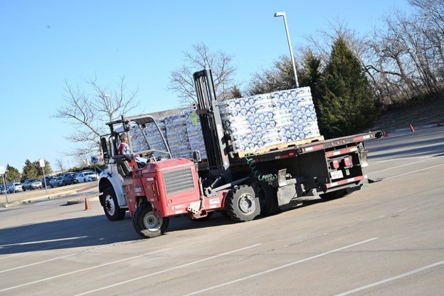 Pallet Jack loading Supplies For Texas churches