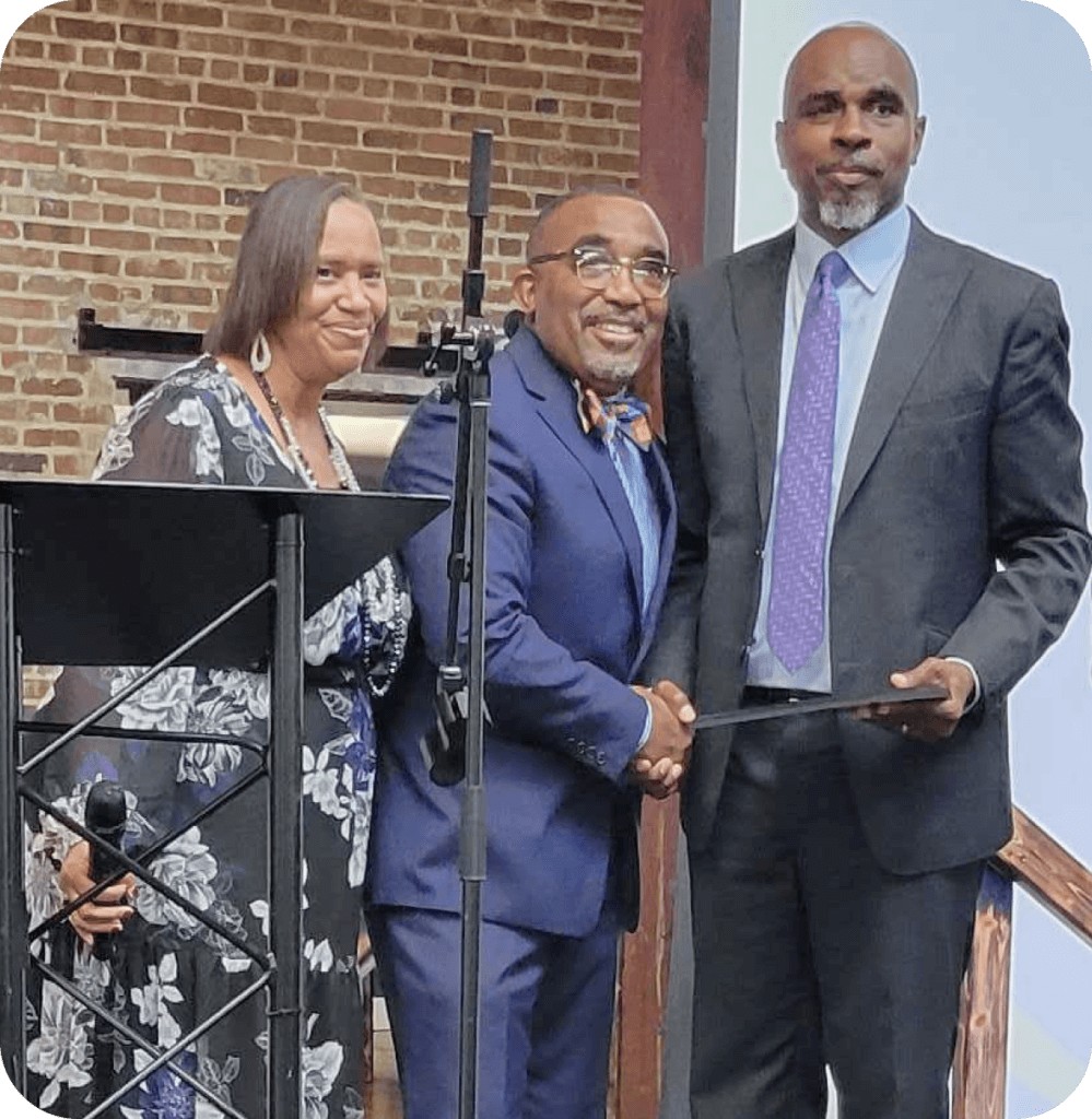 Pastor Ron Pulliam accepting the COGIC Citizenship award