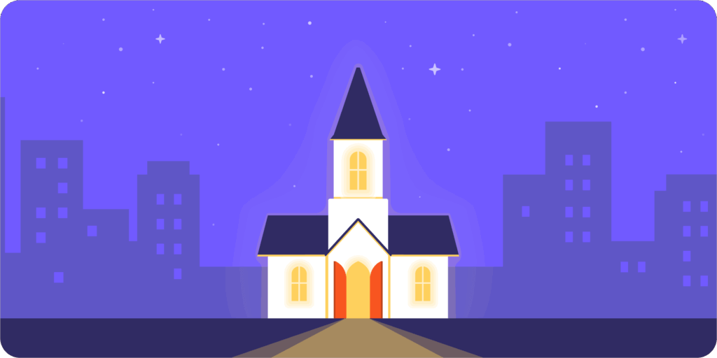 A church shining bright with its lights on on a dark night