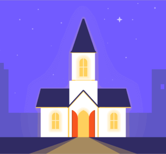 A church shining bright with its lights on on a dark night